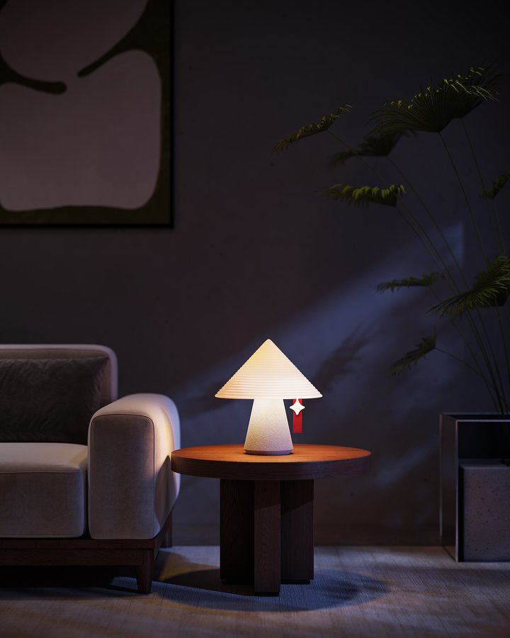The same lavender NOLA lamp glowing warmly in the same living room corner after dark