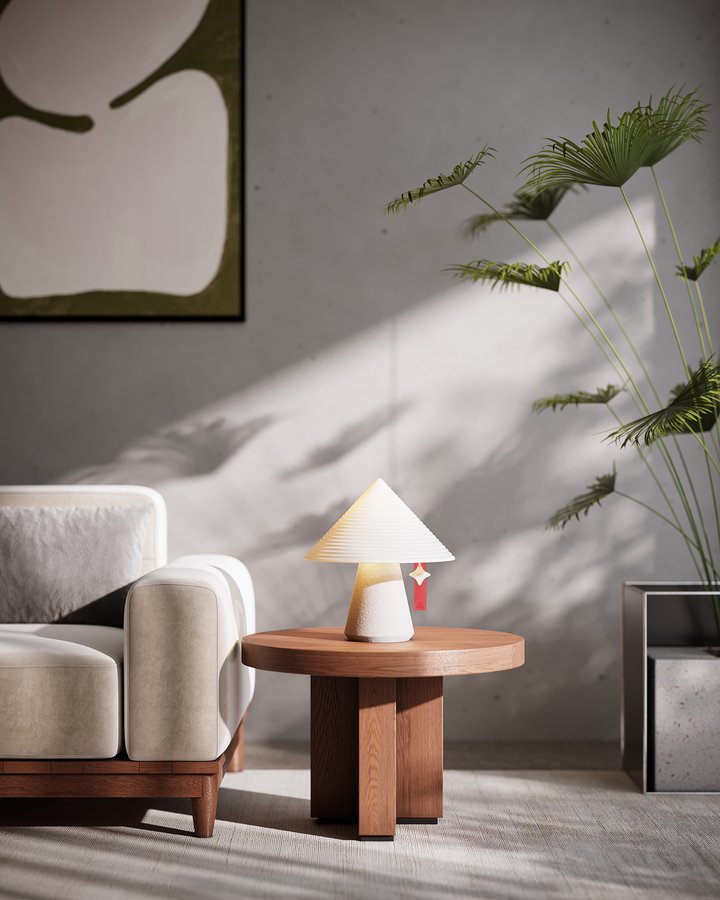 Lavender NOLA lamp on a round wood side table beside a cream sofa, in afternoon sunlight